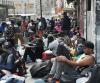 New York City’s `Sanctuary’ Status Draws Thousands of Asylum Seekers Weekly 